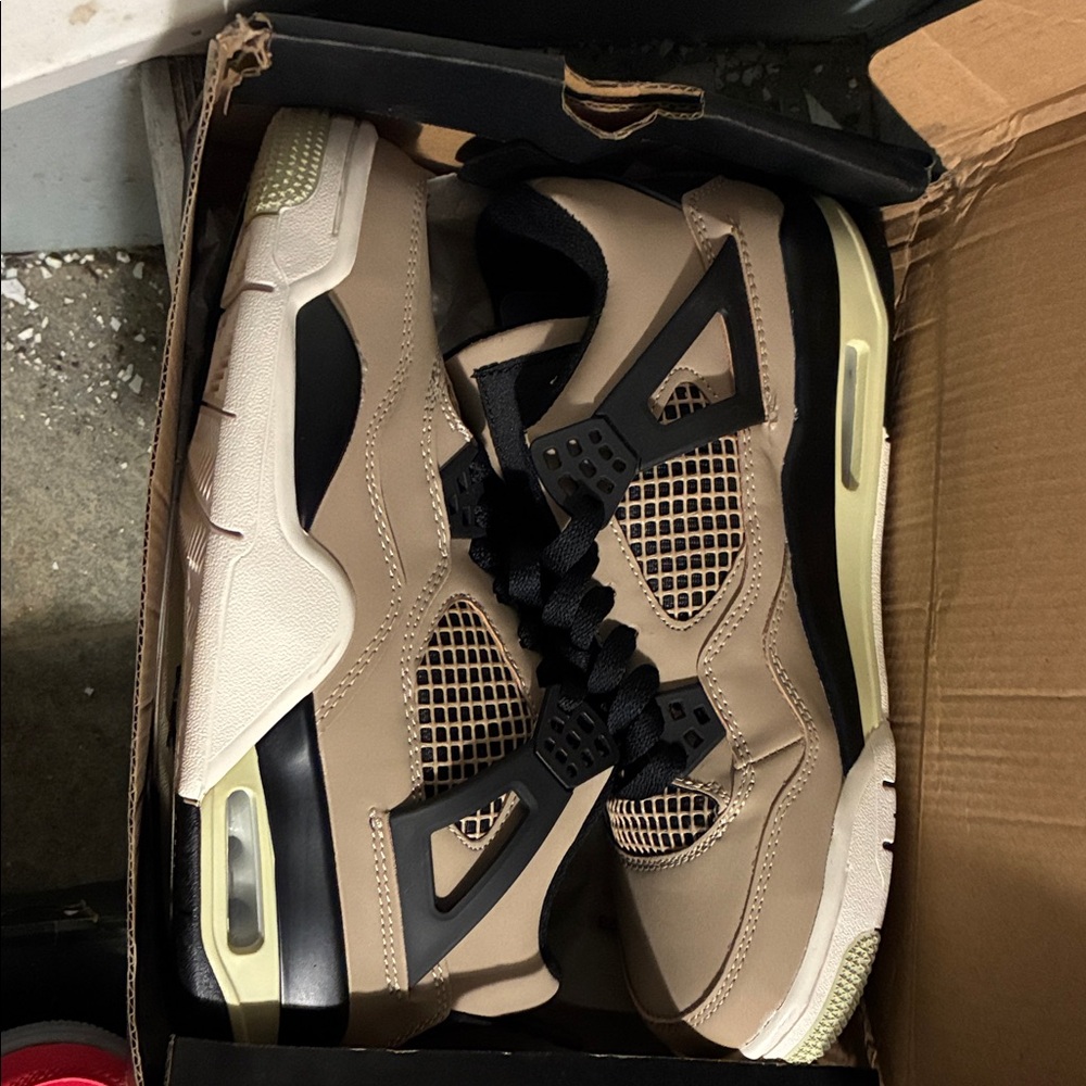 Stylish Beige Sneakers with Black Accents